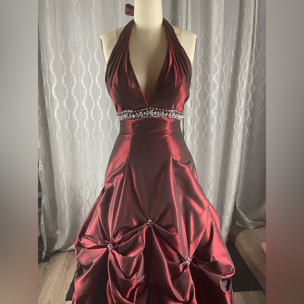 Tiffany Designs maroon prom dress.